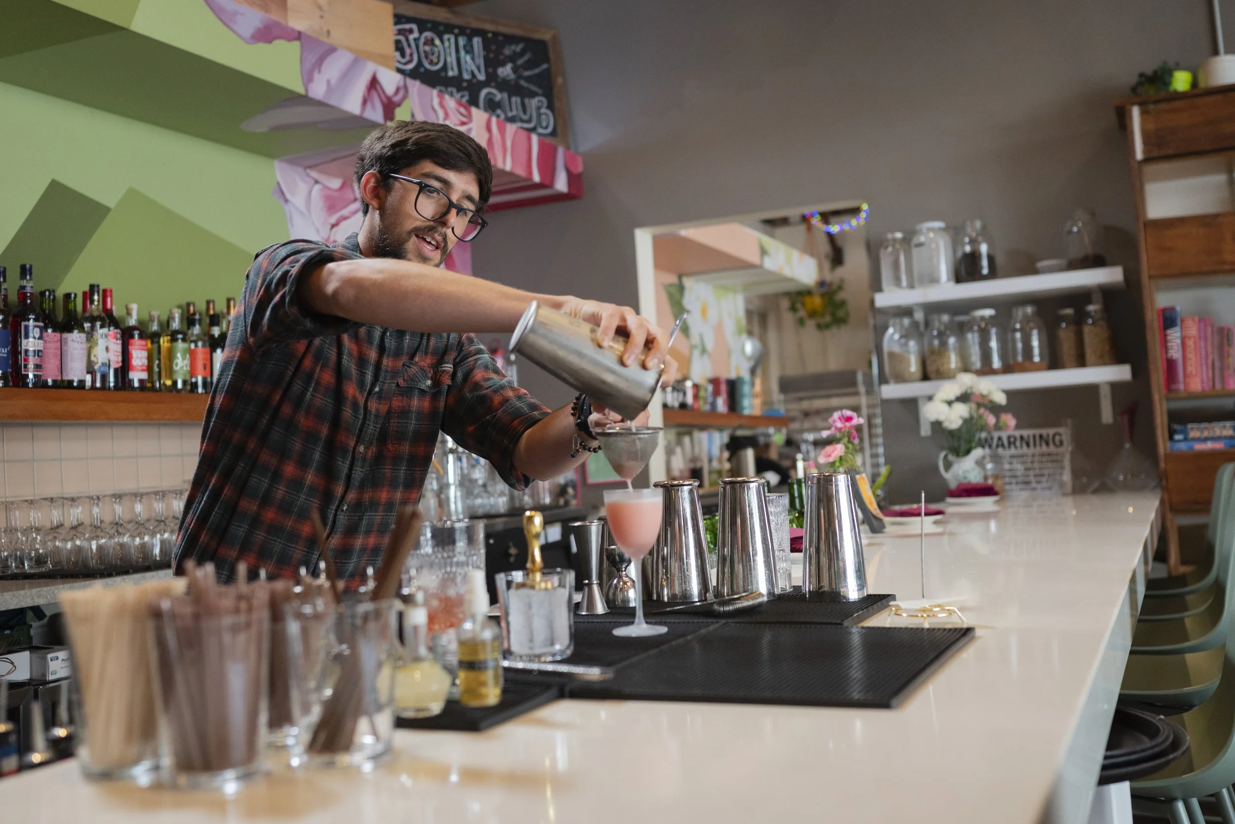 David Devile pours a “Beauty School Dropout” at The Rose Wine Bar on May 15, 2026. (For The San Diego Union-Tribune)