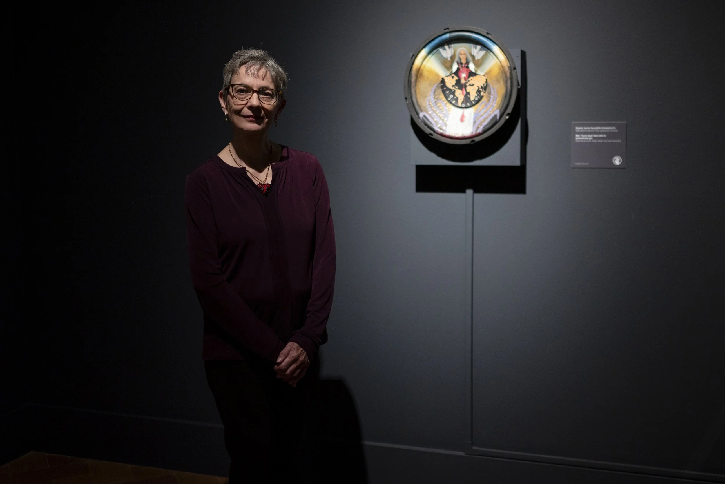 Marianela de la Hoz poses beside her work Guerra, nunca he podido domesticarte (2024), part of Palpitations: The Cadence of Heartbeats at the San Diego Museum of Art on February 4, 2026. (McKenzie Patterson / For The San Diego Union-Tribune)
