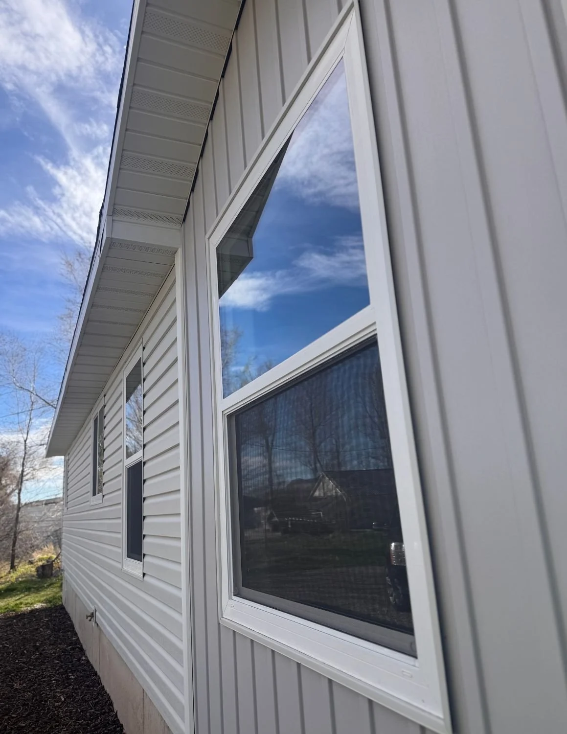 Energy efficient residential window replacement by HWY 38 Glass helping Northern Utah homeowners improve comfort, reduce drafts, and increase home energy performance.