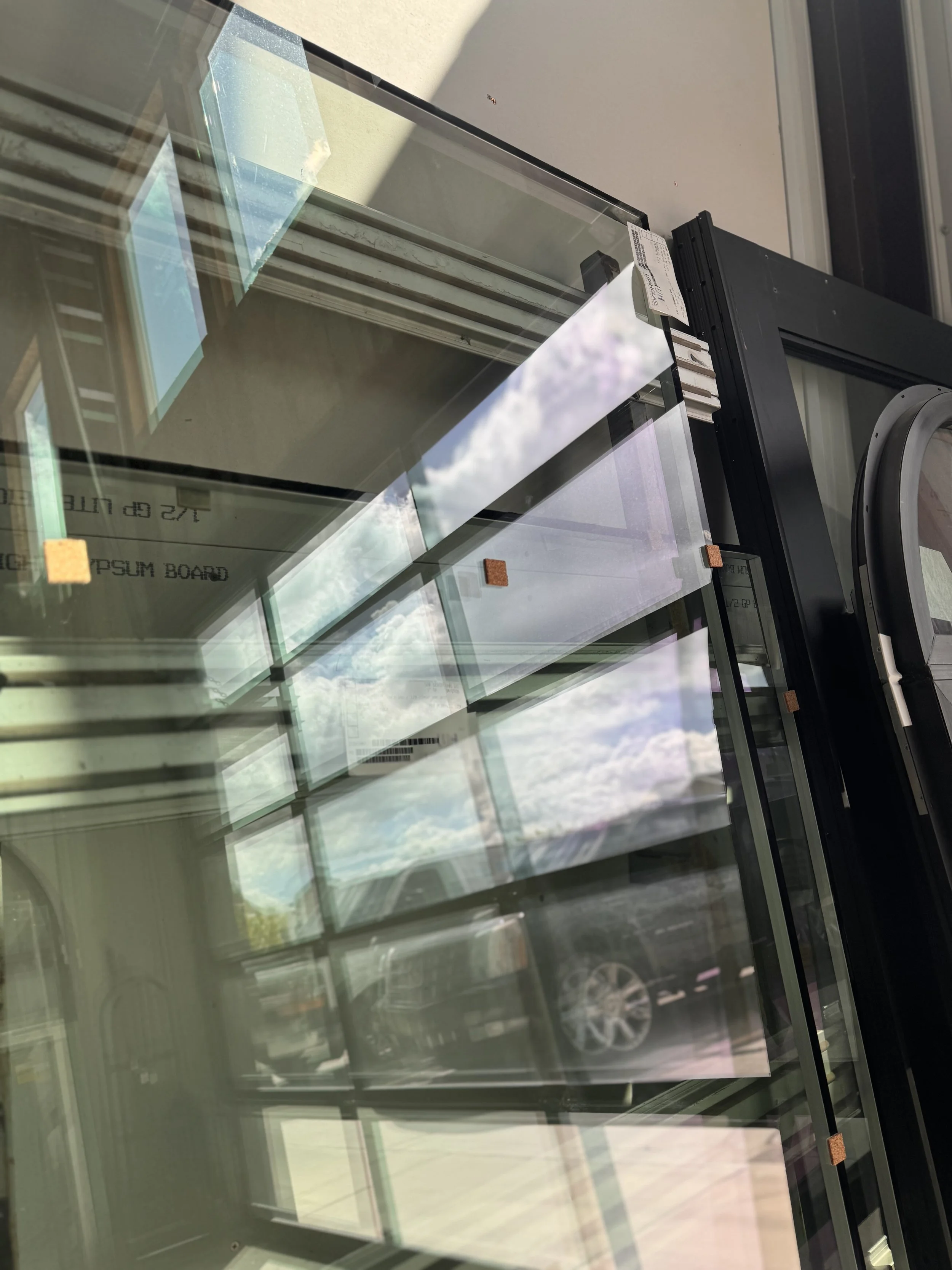 Storefront glass installation in progress on commercial job site in Northern Utah