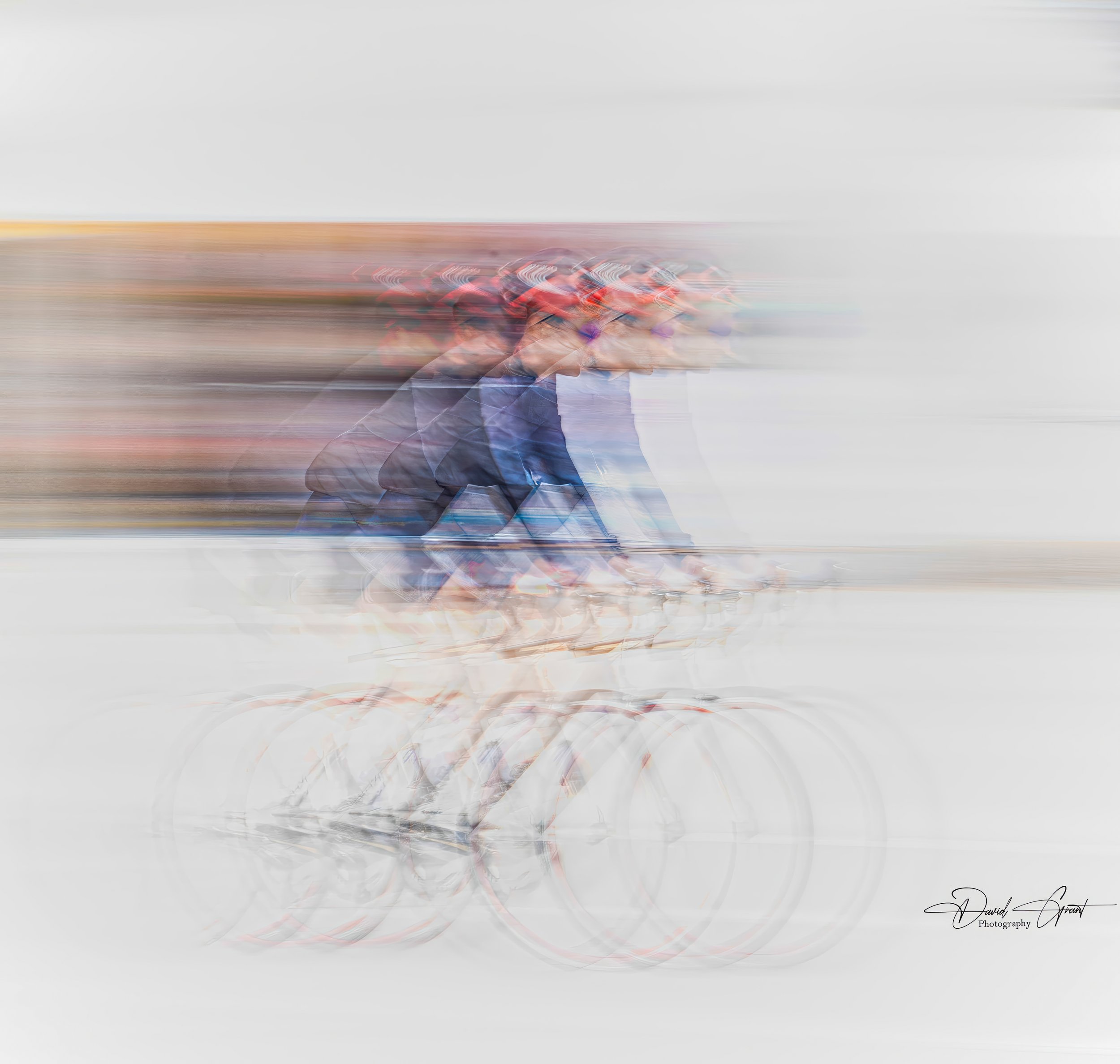 Multiple cyclists in motion creating a motion blur effect, riding in a line on a white background.