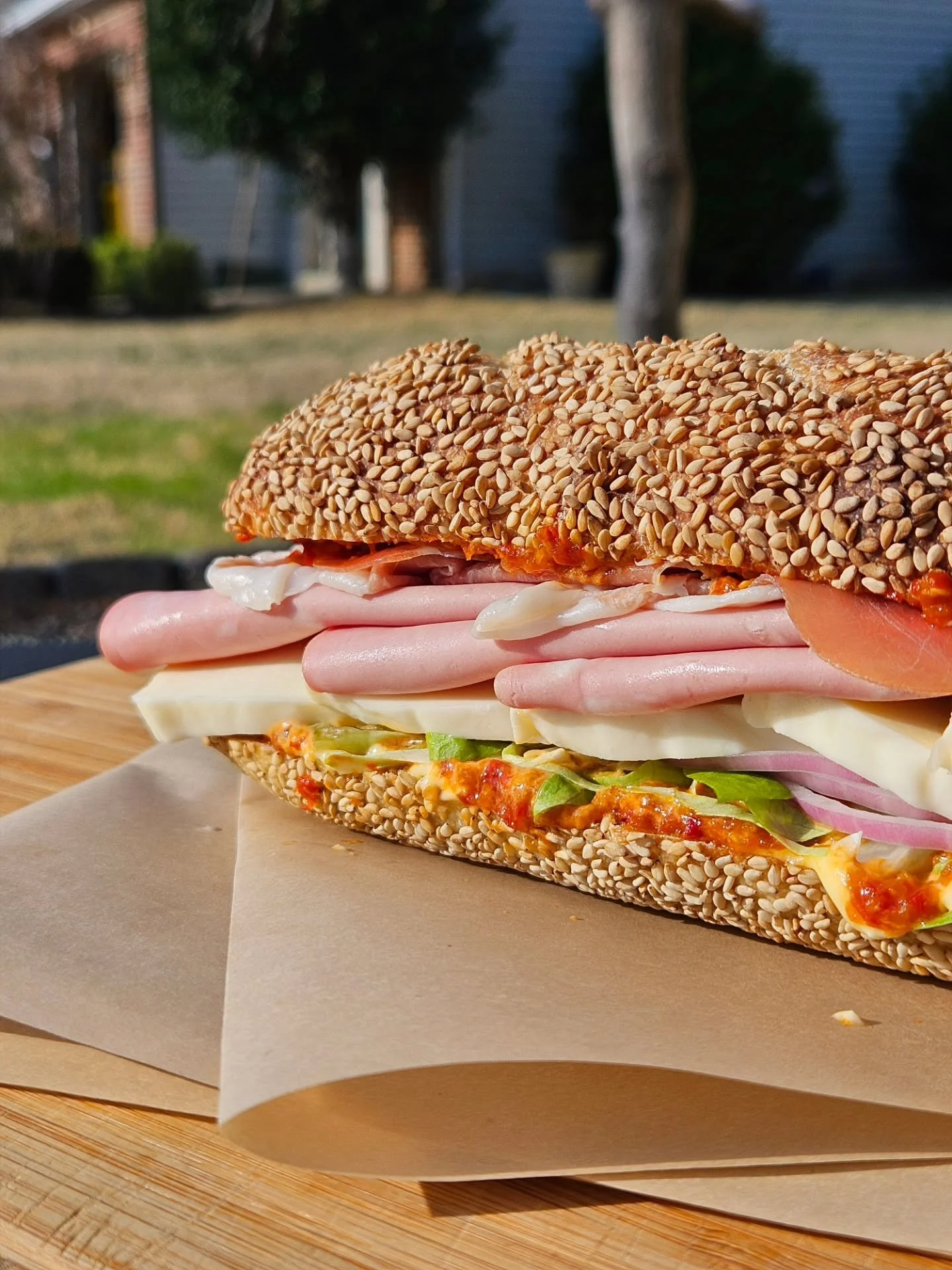 SESAME SEMOLINA SUB ROLLS!!

Behold what kind of 'wich possibilities open up with the proper foundation!!

These bad boys are crusty on the outside, fluffy on the inside, and covered in toasty seeds. Level up your sandwiches. Buy these rolls!! (Psst.