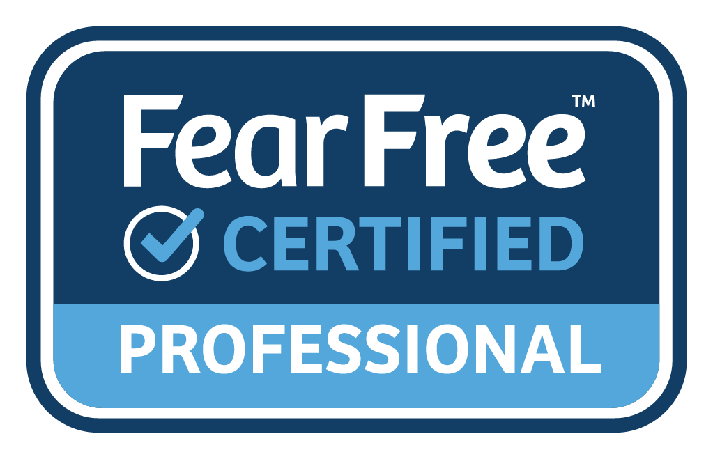 Fear Free Certified Professional badge with checkmark logo in blue and white.