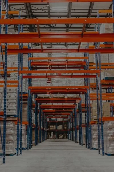 Warehouse storage racks holding pallets of goods