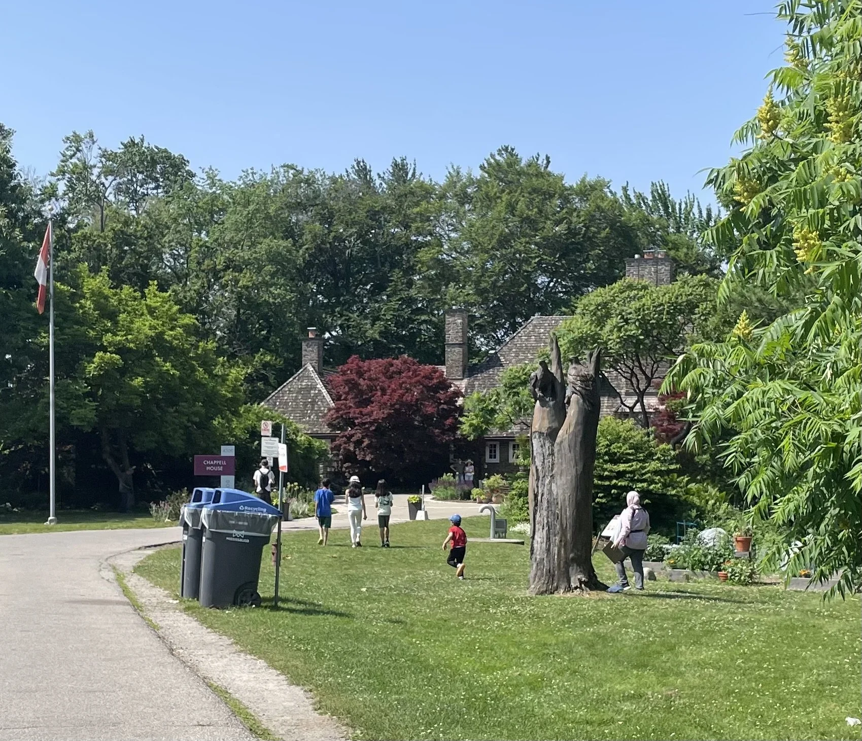 Children outside performing the scavenger hunt