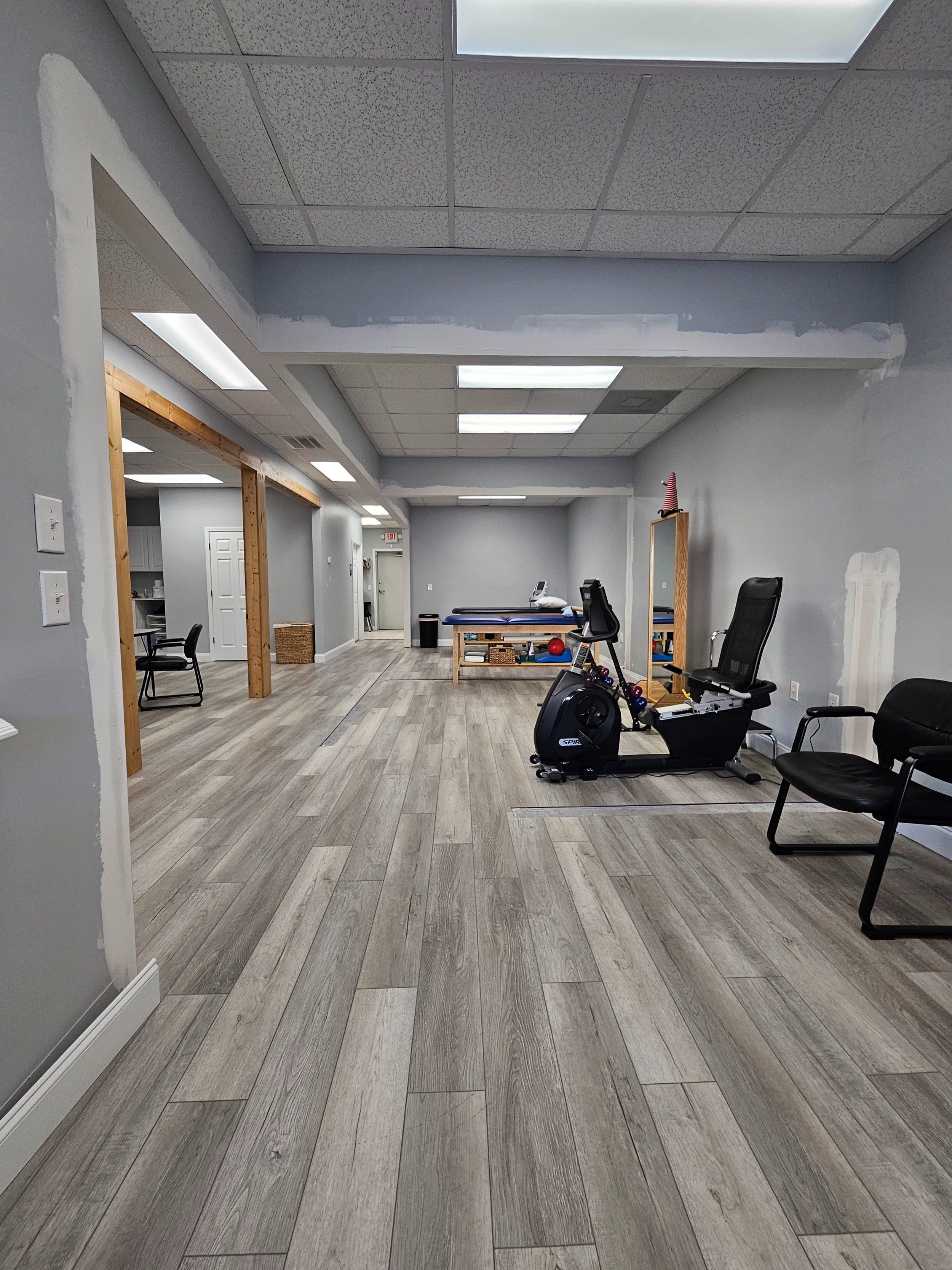 office renovation, drywall repair, in progress
