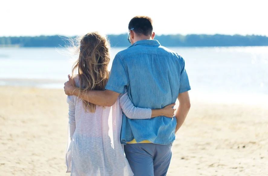Happy couple on the beach