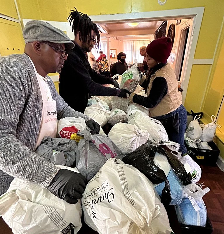 WSWA volunteers sort donated turkeys for Thanksgiving food basket distribution