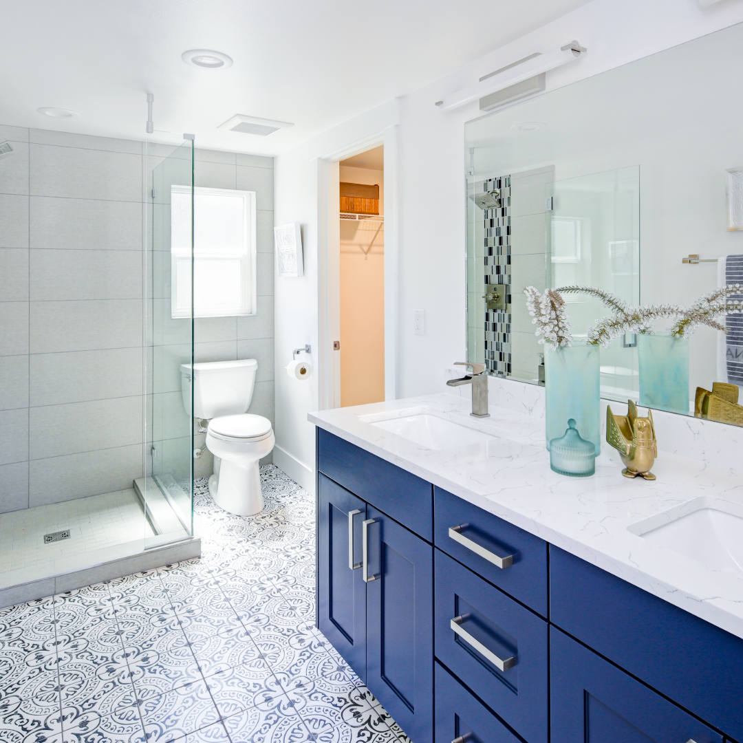 Modern bathroom renovation with custom vanity and glass shower