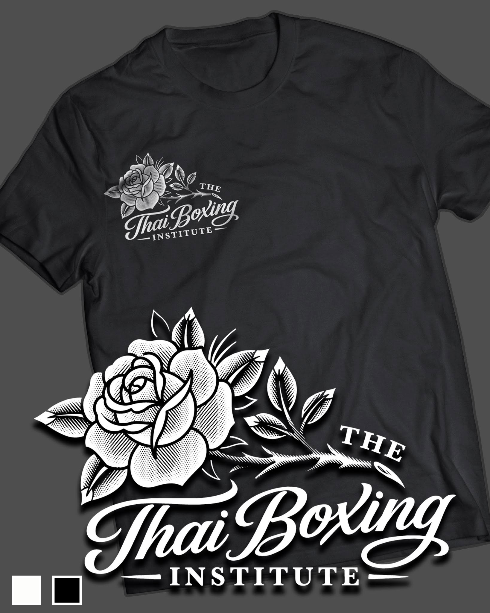 Black T-shirt featuring white graphic design with a large rose flower, smaller floral details, and text that reads 'The Thai Boxing Institute'.