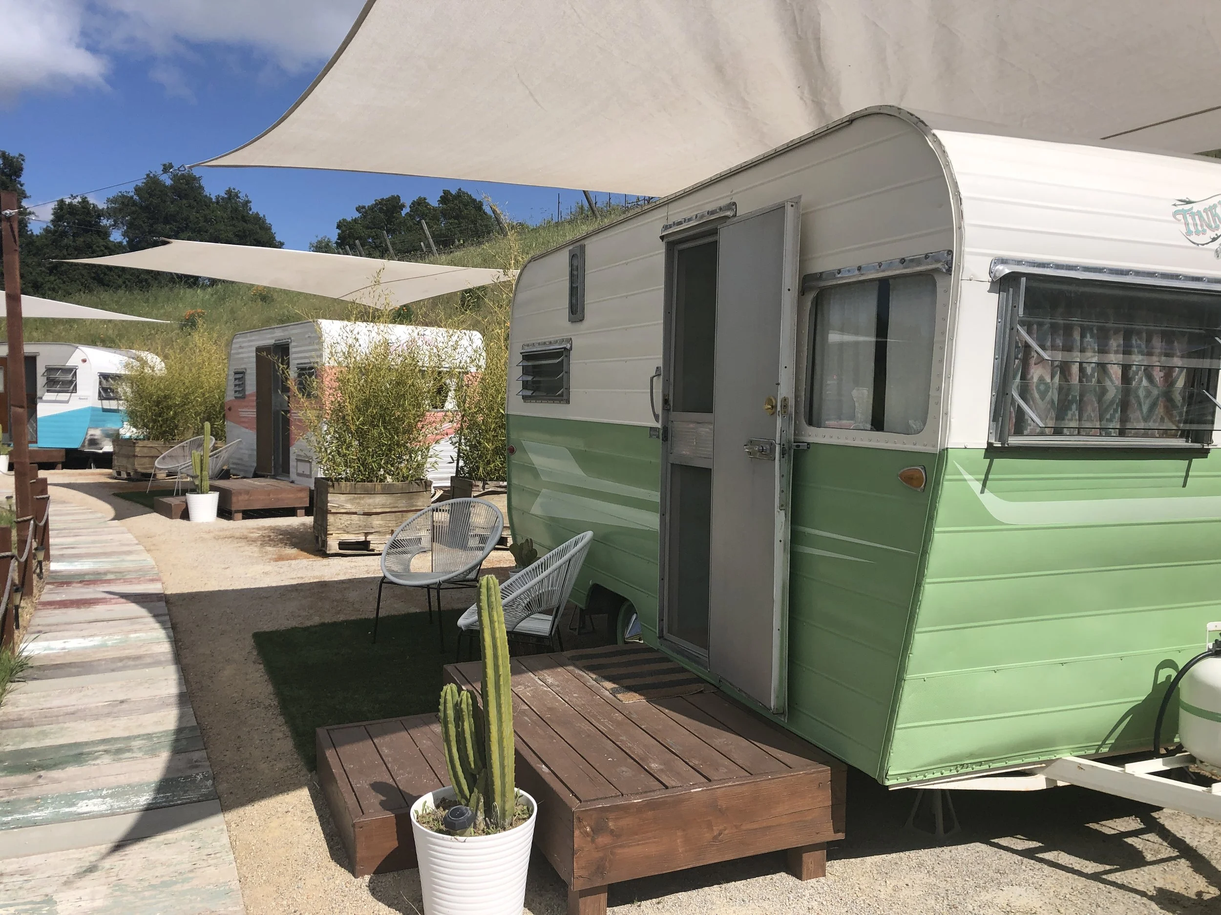 Each trailer has a porch to enjoy your morning coffee on