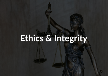 The scales of justice, a woman holding a balanced scale, is featured. The image is darkened and the words Ethics and Integrity are over it. 