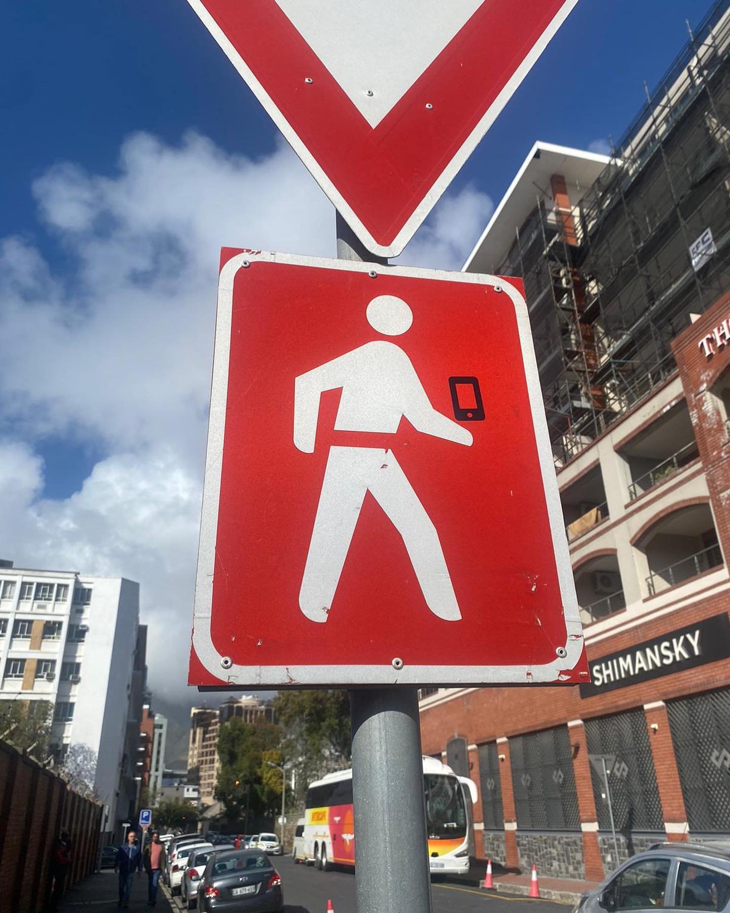CAUTION: People are walking around Cape Town looking at their phones instead of the world around them. #cautioncellphones 📱👀⚠️
