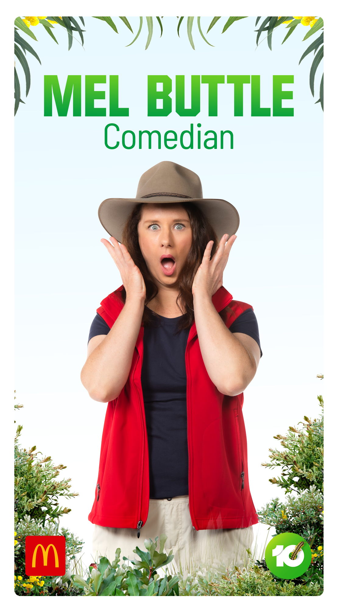 A woman wearing a beige wide-brim hat, red vest, and navy shirt, standing outdoors among green bushes, with her hands near her face in surprise, on a promotional poster for Mel Buttle, a comedian.