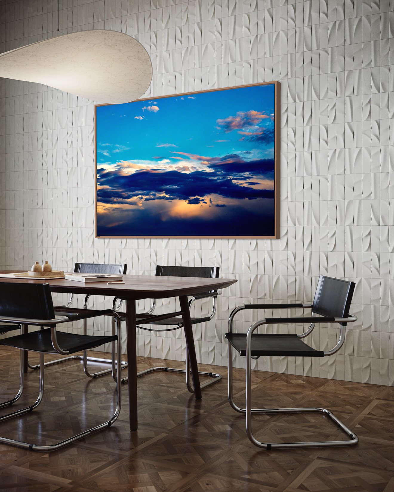 "Hold On" photographic wall art in a handcrafted frame, depicted in a dining room setting. The artwork shows storm clouds crossing the beginning sunset in an otherwise blue sky at Pambula Beach.