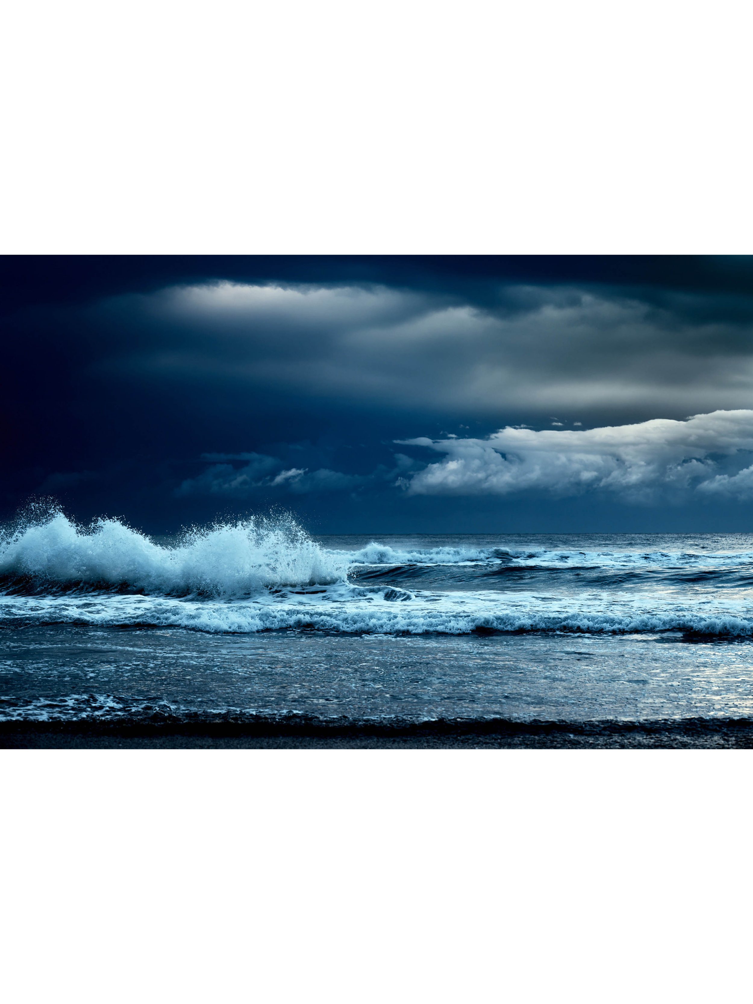 "Soul Search" photographic wall art depicting storm clouds gathering in an inky sky above crashing ocean waves at Pambula Beach.