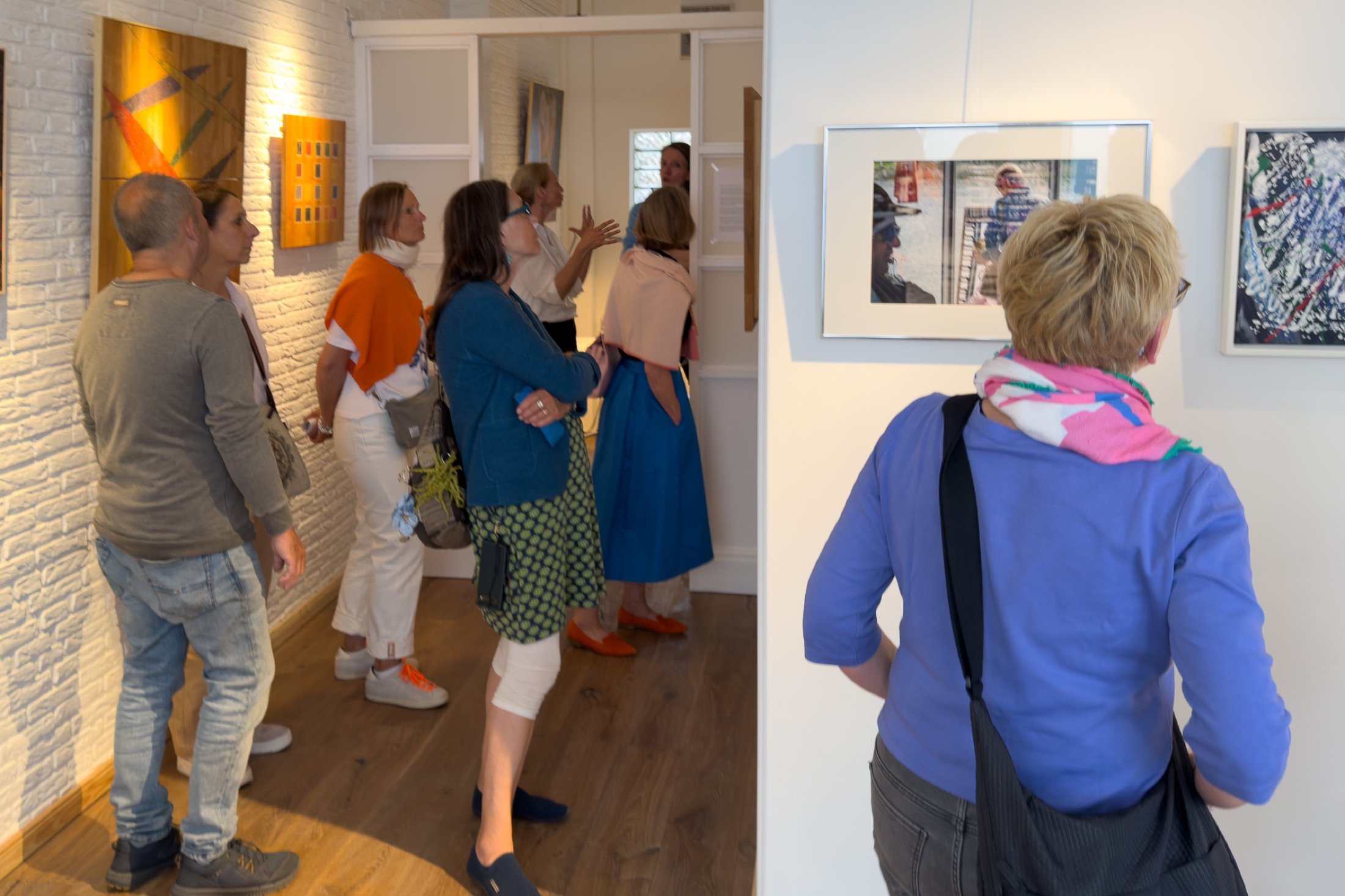 Visitors engaging with Echoes of Becoming