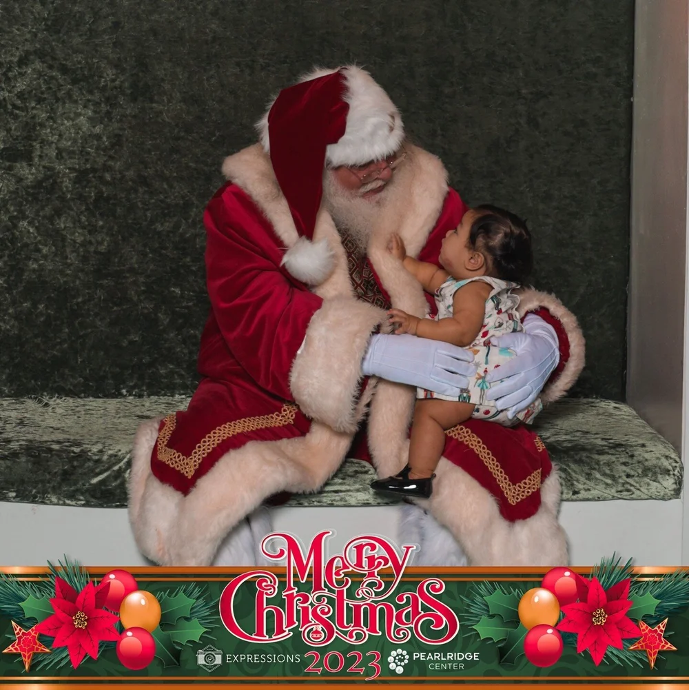 Merry Christmas from my little family.💚❤️🎄❤️💚 My mom made us do photos with Santa up till I was... 26...27? Lol. I'm determined to make my child do the same. 😂 #MerryChristmas #FamilyPhoto