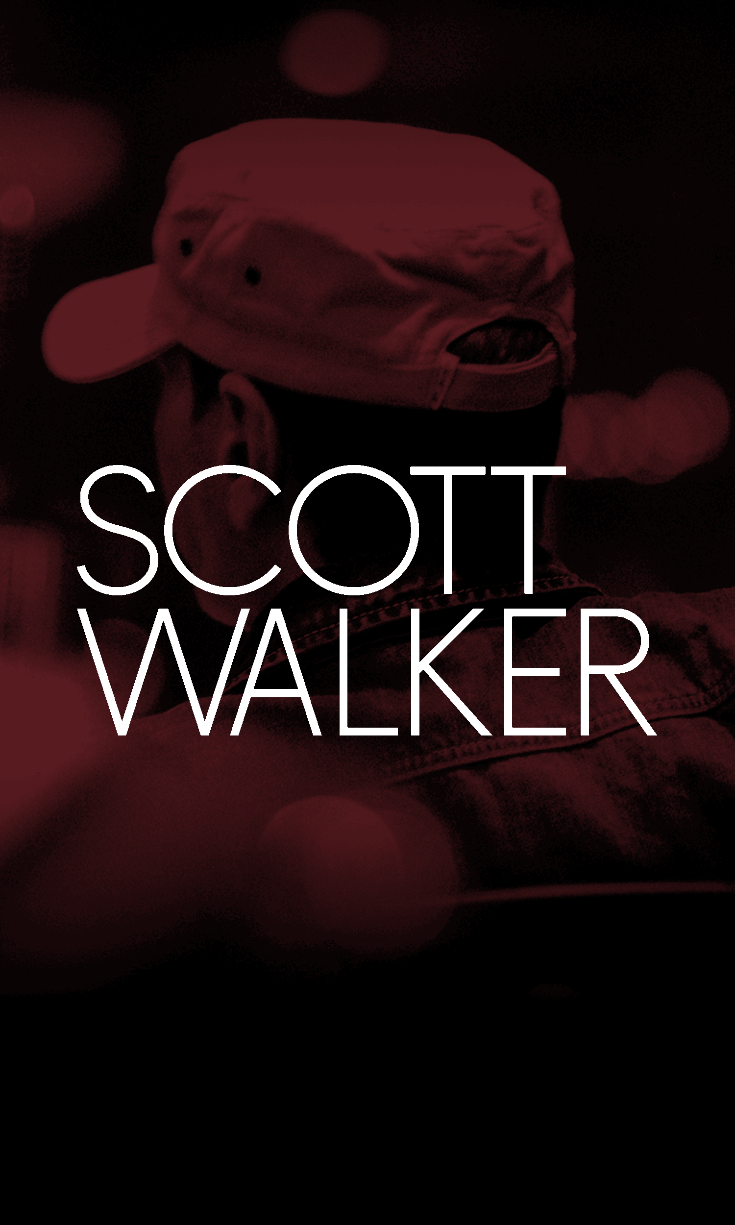 Scott Walker wearing a cap, with his back to the camera, with a red tint overlay, standing in front of a dark background with red bokeh light effects. Text overlay reads "SCOTT WALKER".