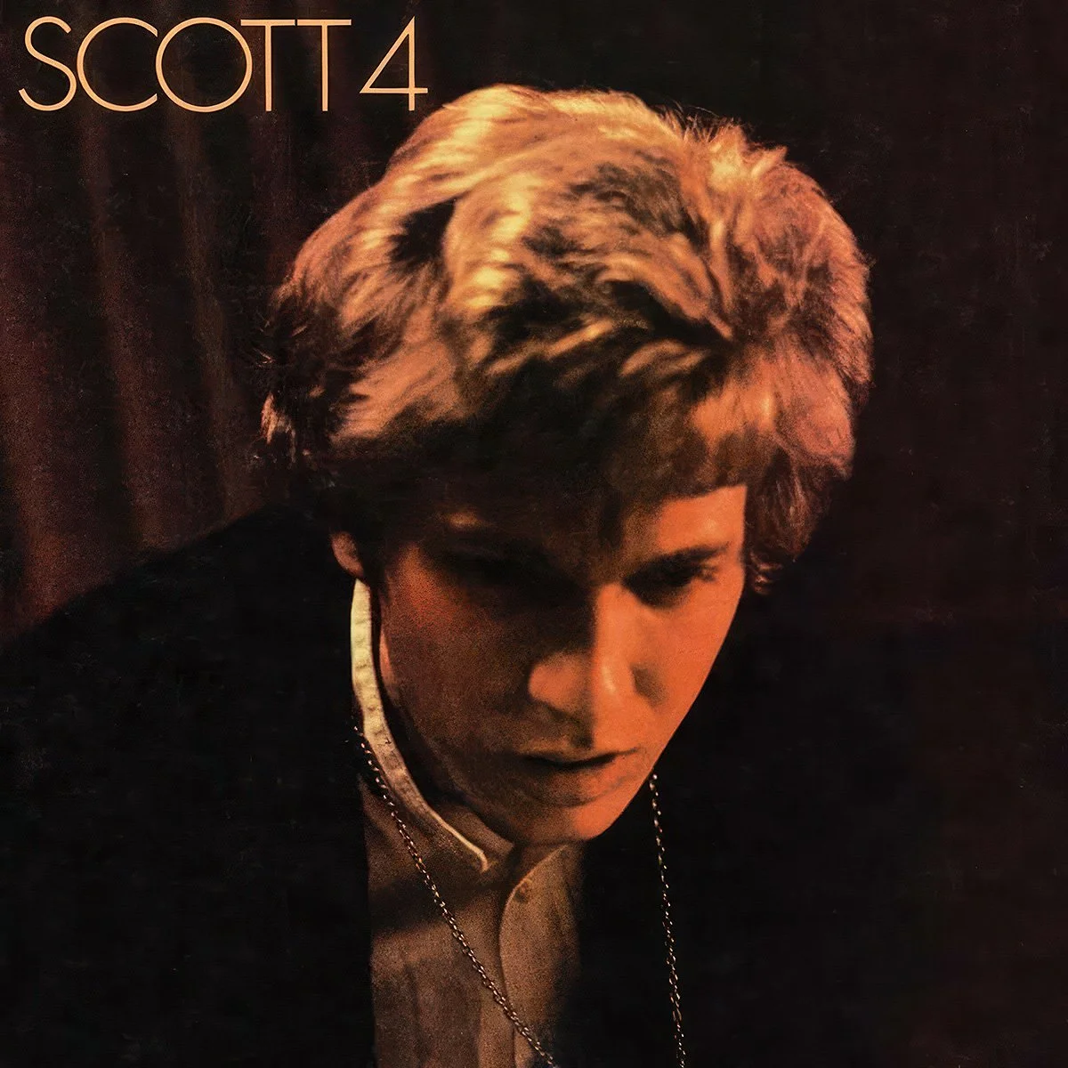 Album cover featuring a portrait photograph of Scott Walker with two-tone blonde and darker hair, looking downward, with the words 'SCOTT 4' written in the upper left corner.