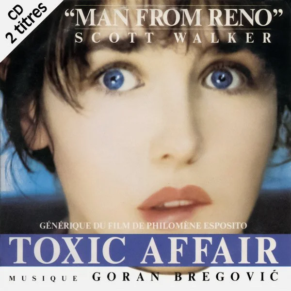 Cover of a CD single titled 'Toxic Affair' by Goran Bregović, featuring a close-up of a woman with blue eyes and dark hair, with the film title 'Man from Reno' by Scott Walker mentioned at the top.
