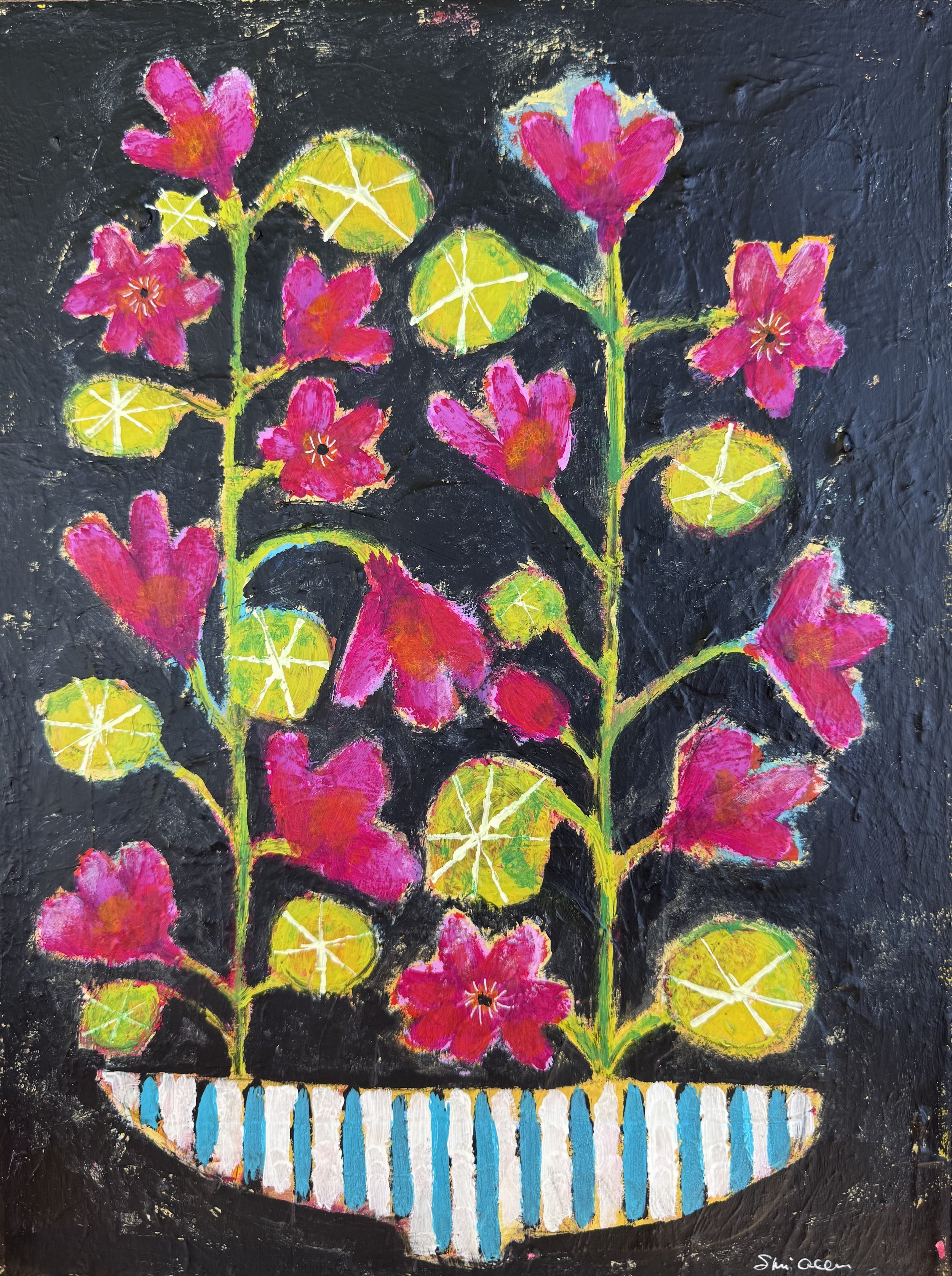 Nasturtiums in a stripey vase