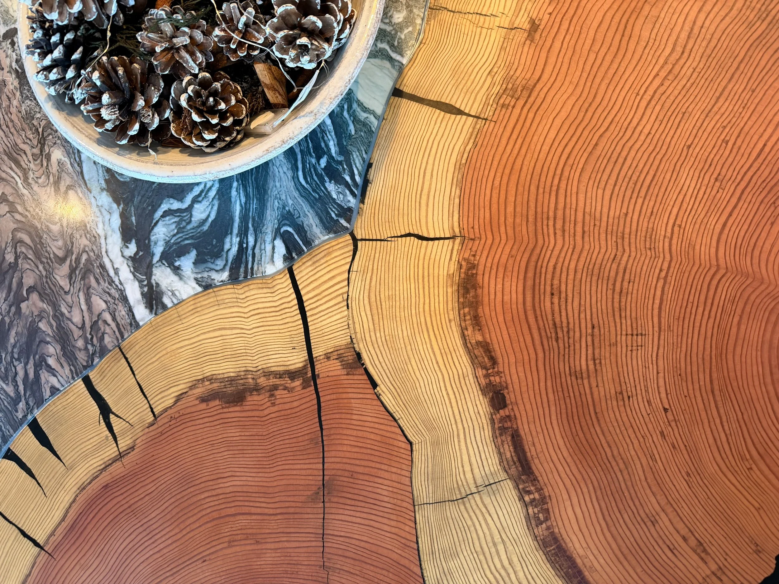 Bespoke Redwood table scribed into the stone worktop.