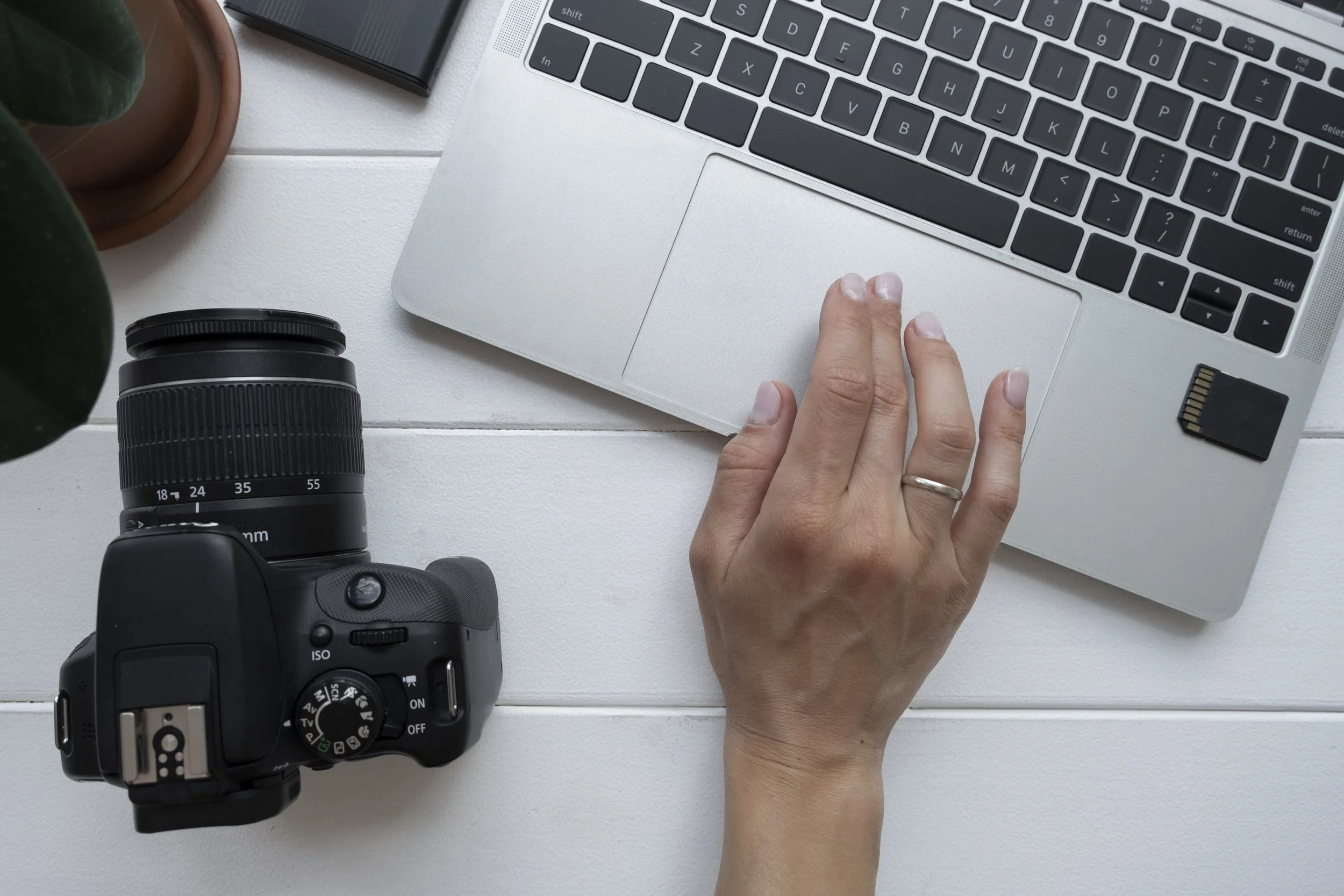 top-view-hand-with-photo-camera (1).jpg
