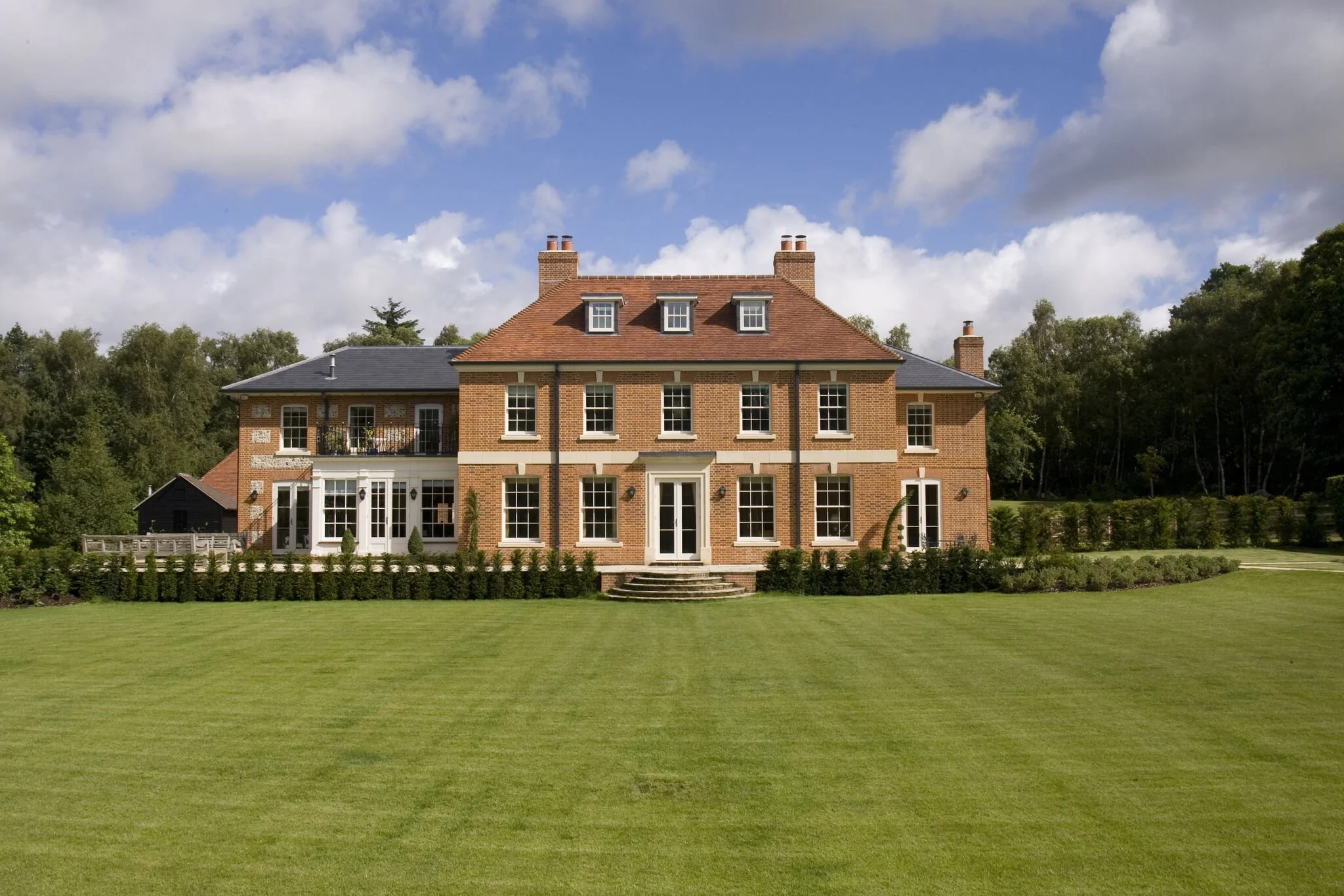 From an Understated Bungalow to a Classical Country House