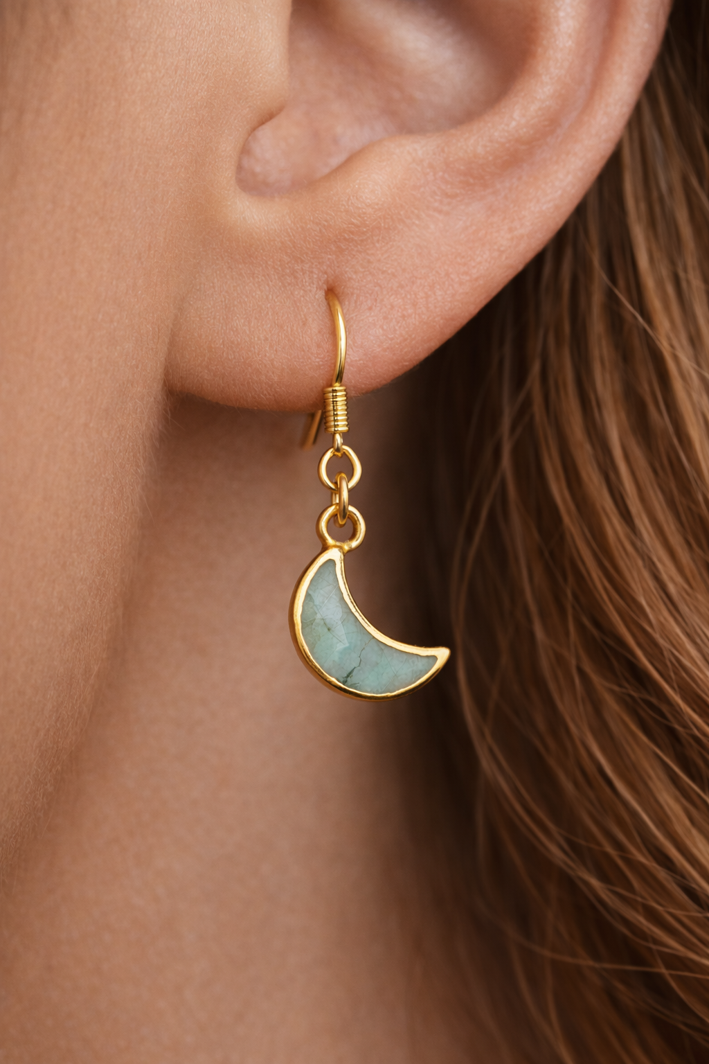 emearld moon earrings closeup model.png
