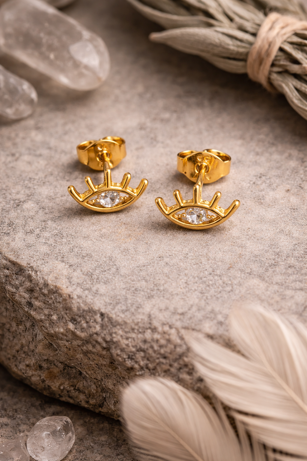 eye stud earrings 2.png