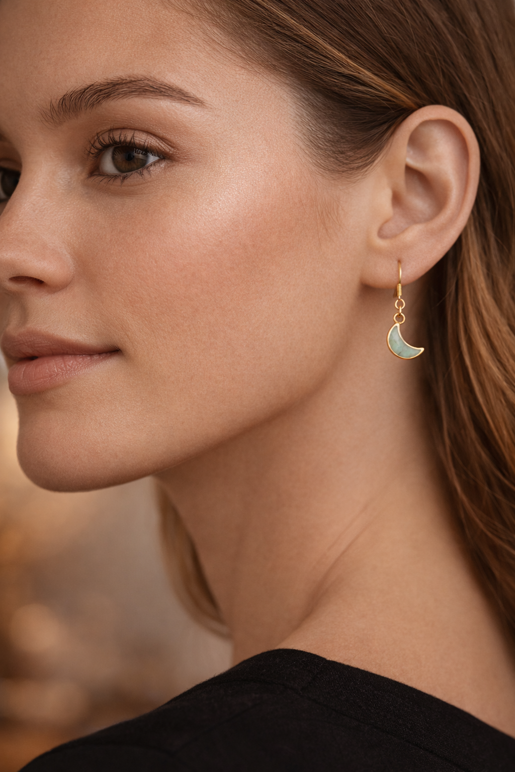 model emerald moon earrings.png