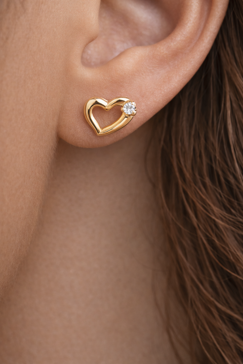 close up heart stud earrings.png