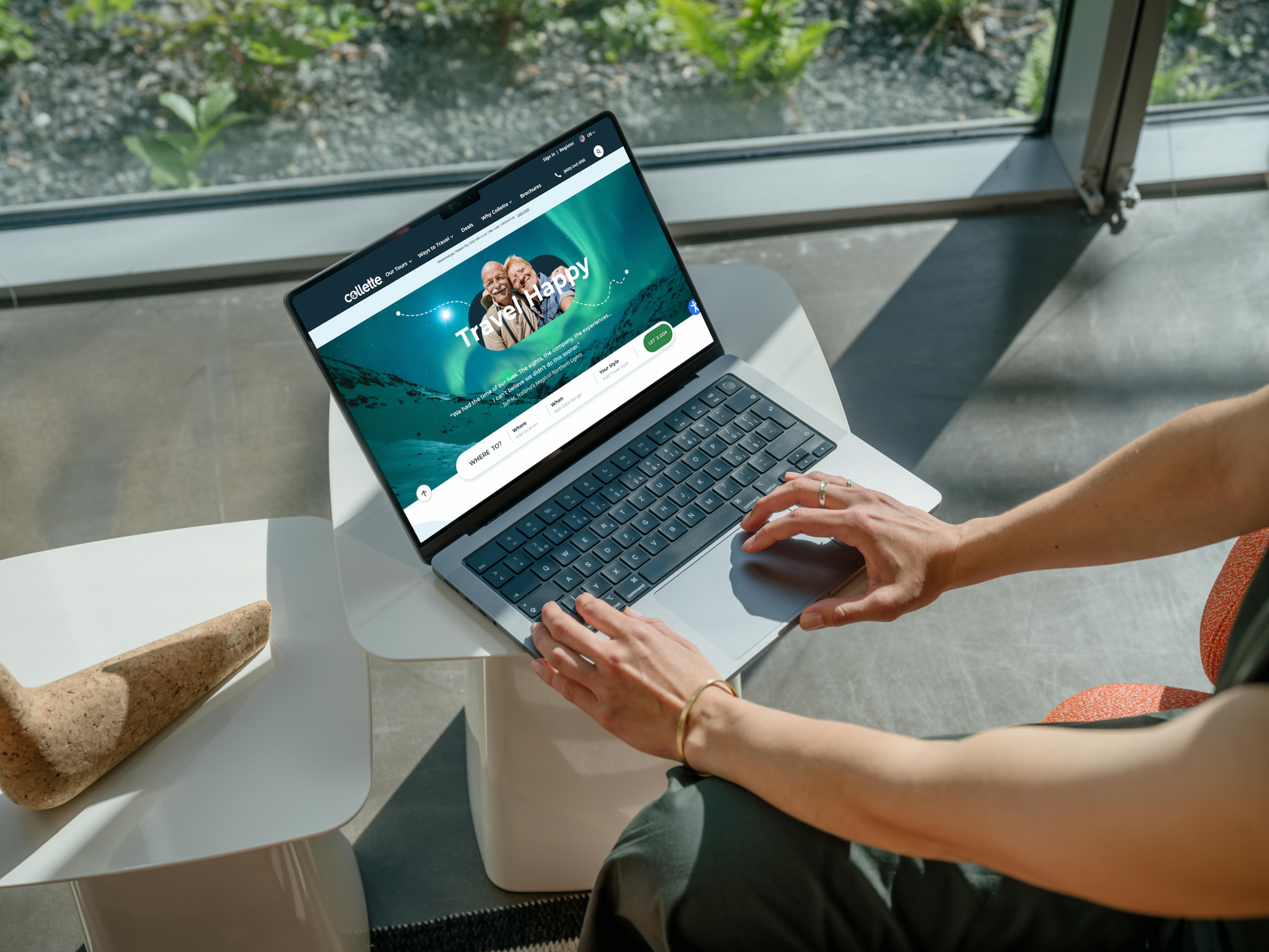 Woman visits a travel website to plan a trip.