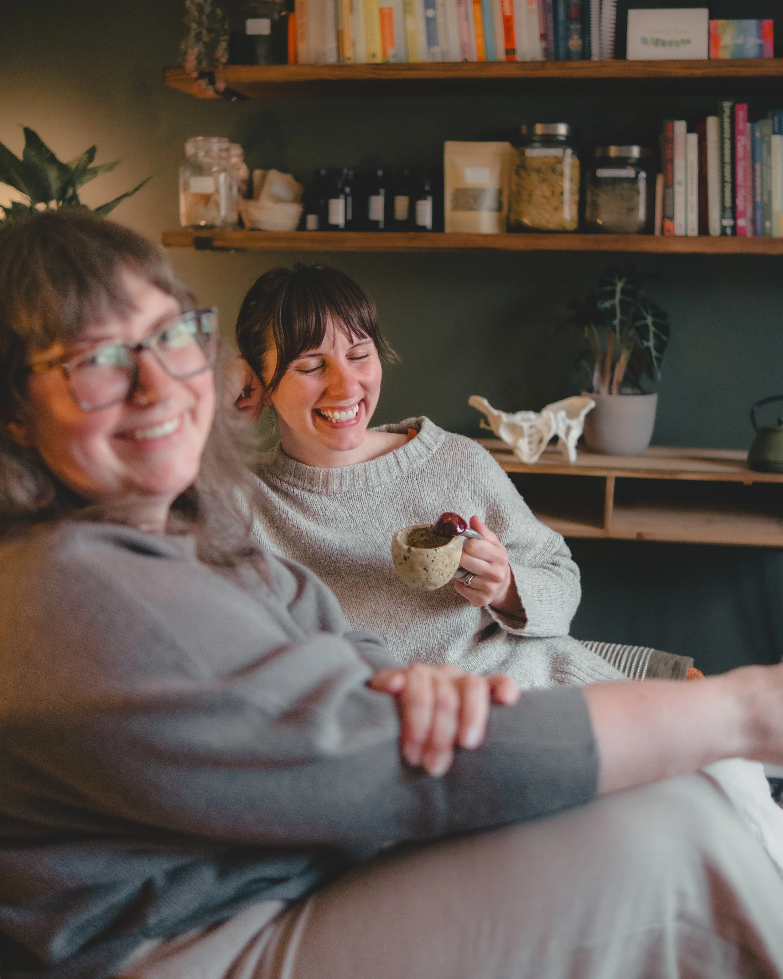 Doulas Ash and Eva providing personalized prenatal education and birth planning for a Medicaid client in Traverse City.