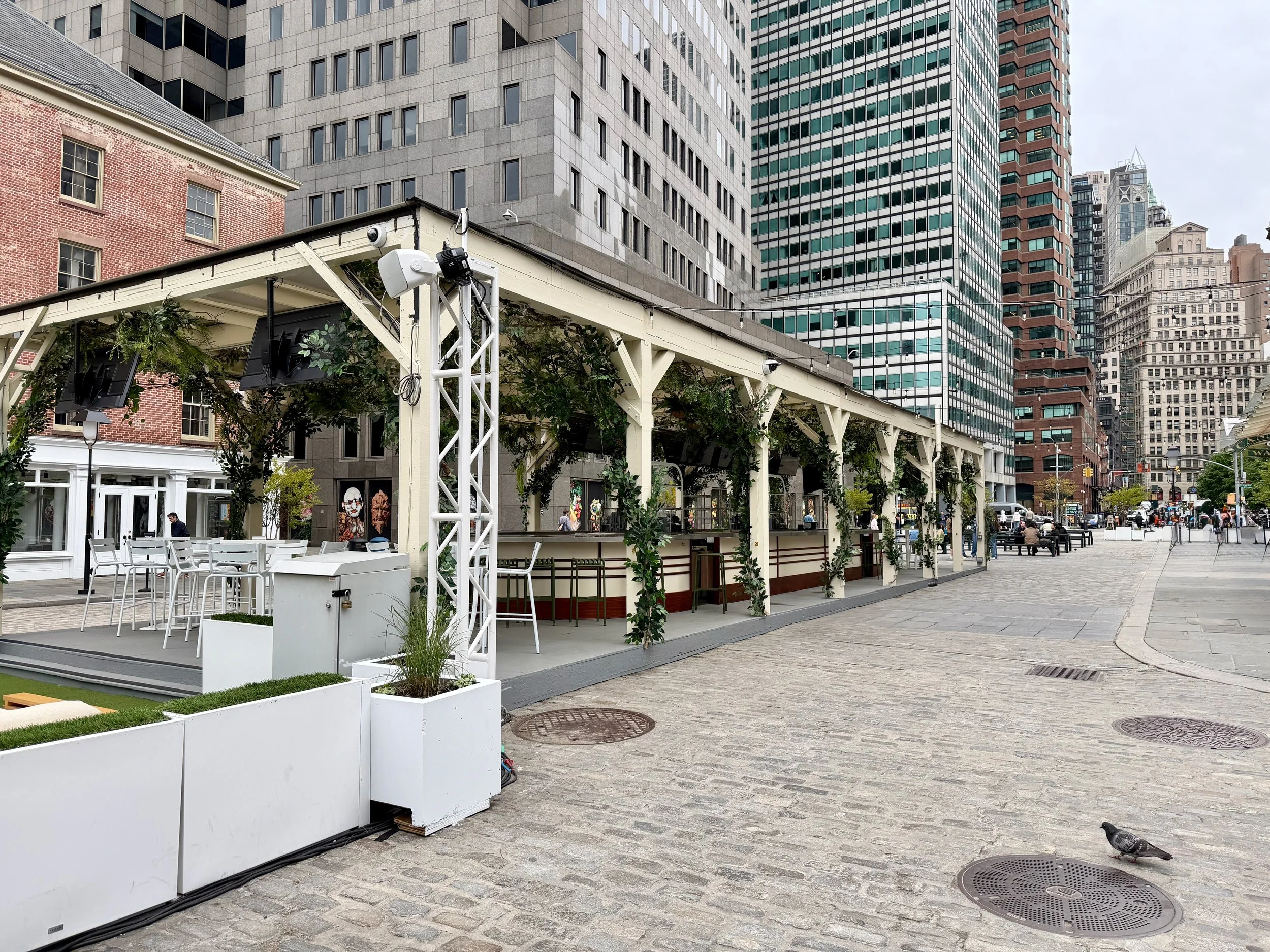 Outdoor greenery decor for a garden bar patio at Seaport New York