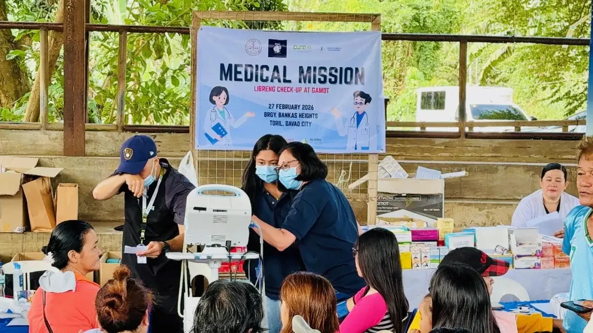 Volunteer medical team providing free checkups and medicine at the Barangay Bankas Heights medical mission in Davao City