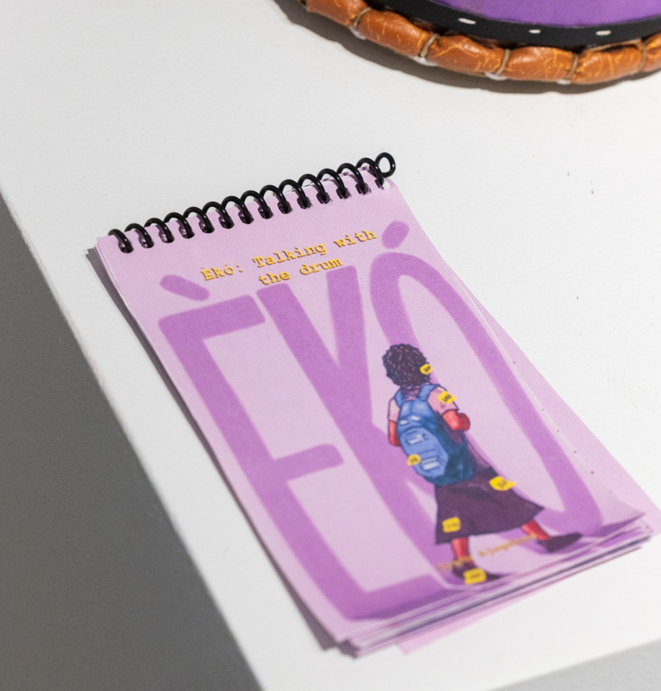 Close up of Eko Booklet (Talking with the drum); Photo by Polina Teif
