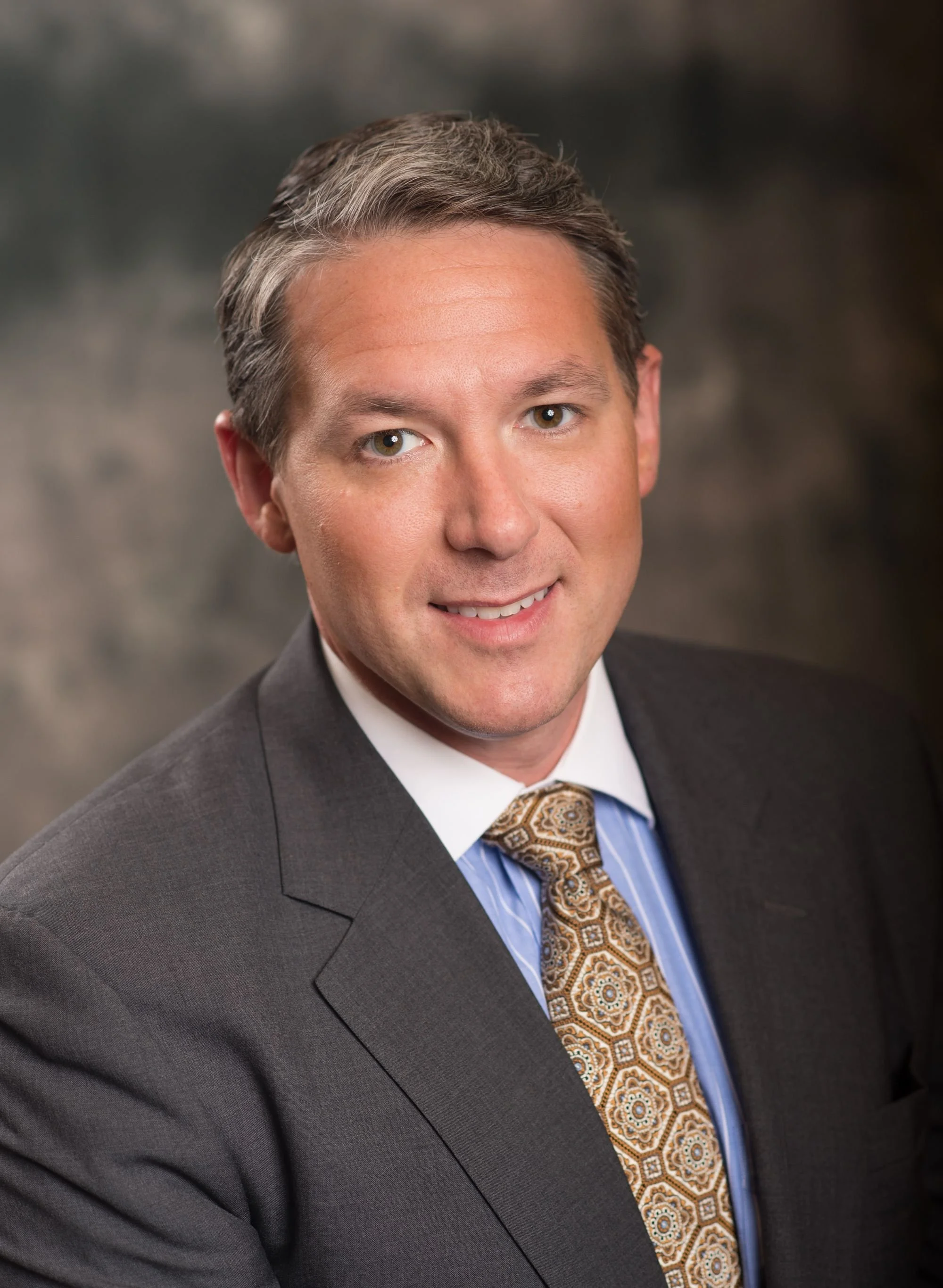 65d4d5255123c8af0d91d664_RustyZosel headshot 20141001v2-p-2000.jpg