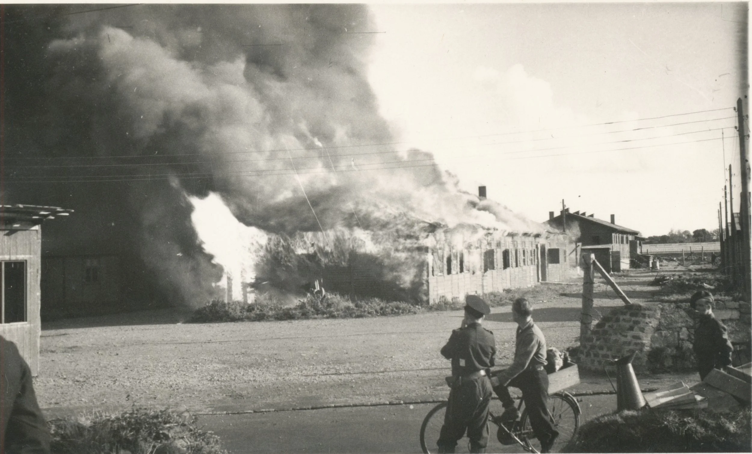 Burning the slave workers' accommodation.jpg
