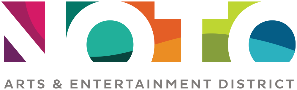 Colorful abstract geometric shapes in various colors including pink, teal, orange, green, and blue.