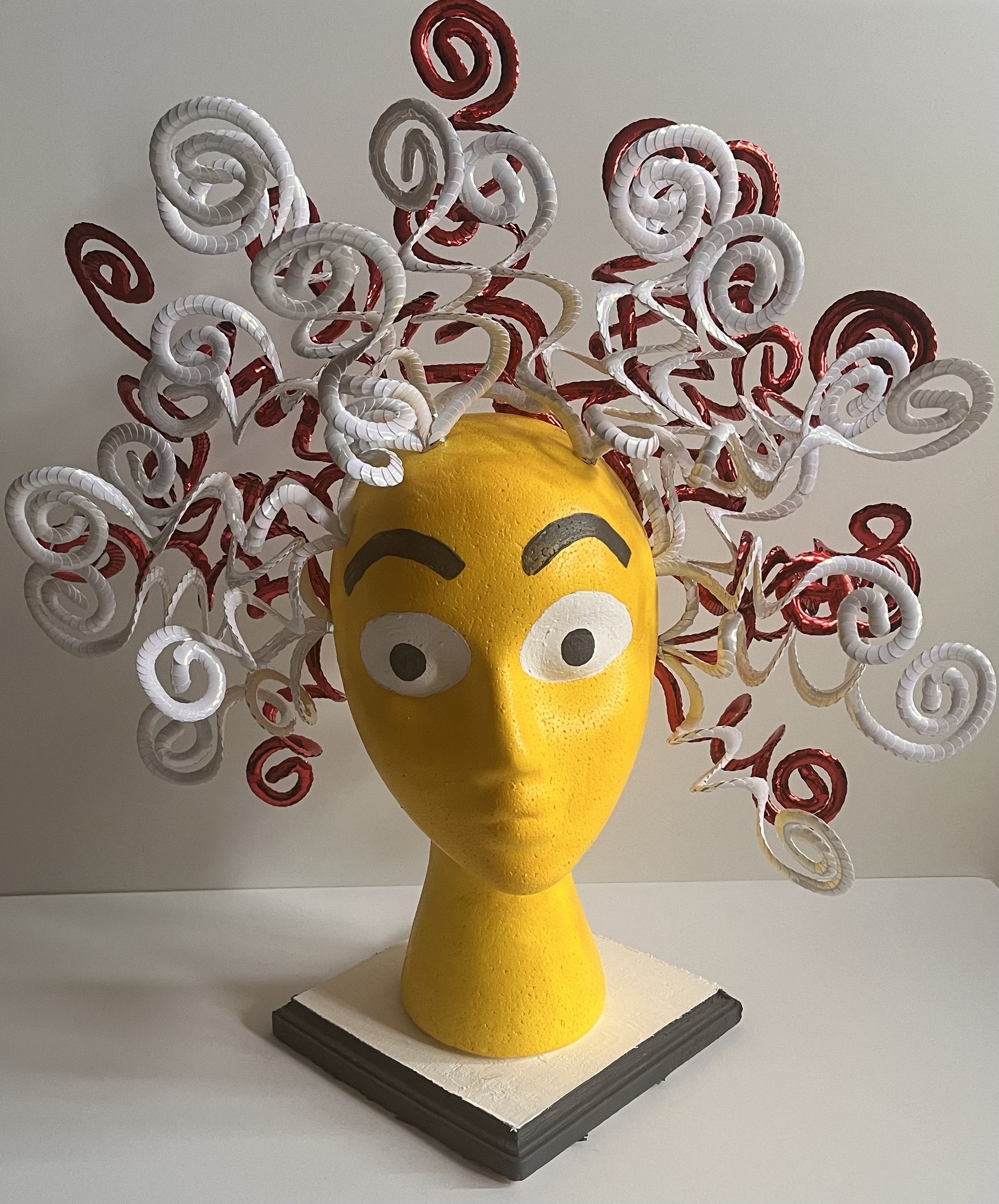 Frozen: This piece is about having increased anxiety after surgery. The curly hair is meant to reflect this. The eyes are meant to appear shocked! The black-and-white base is meant to illustrate my black-and-white thoughts, which contributed to my an