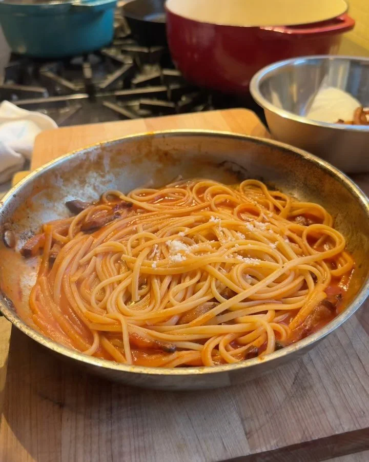 Amatriciana. Mine has 3 ingredients Guanciale, tomato, and pecorino
