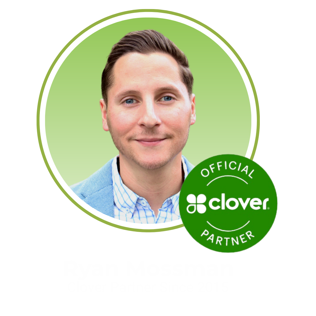 Headshot of a man with light brown hair and blue eyes, smiling, wearing a blue checked shirt and blazer, against a green background with a white circular border, and a green seal that reads 'Official Clover Partner'.