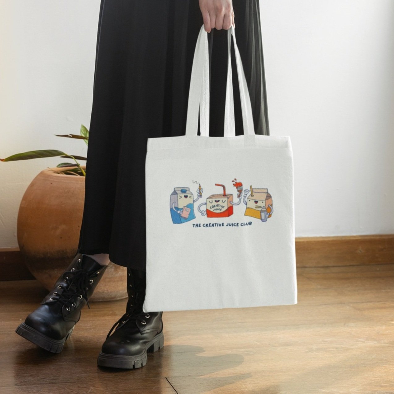 tote-bag-mockup-featuring-a-stylish-woman-carrying-a-tote-bag-with-an-alternative-look-m31727.jpg