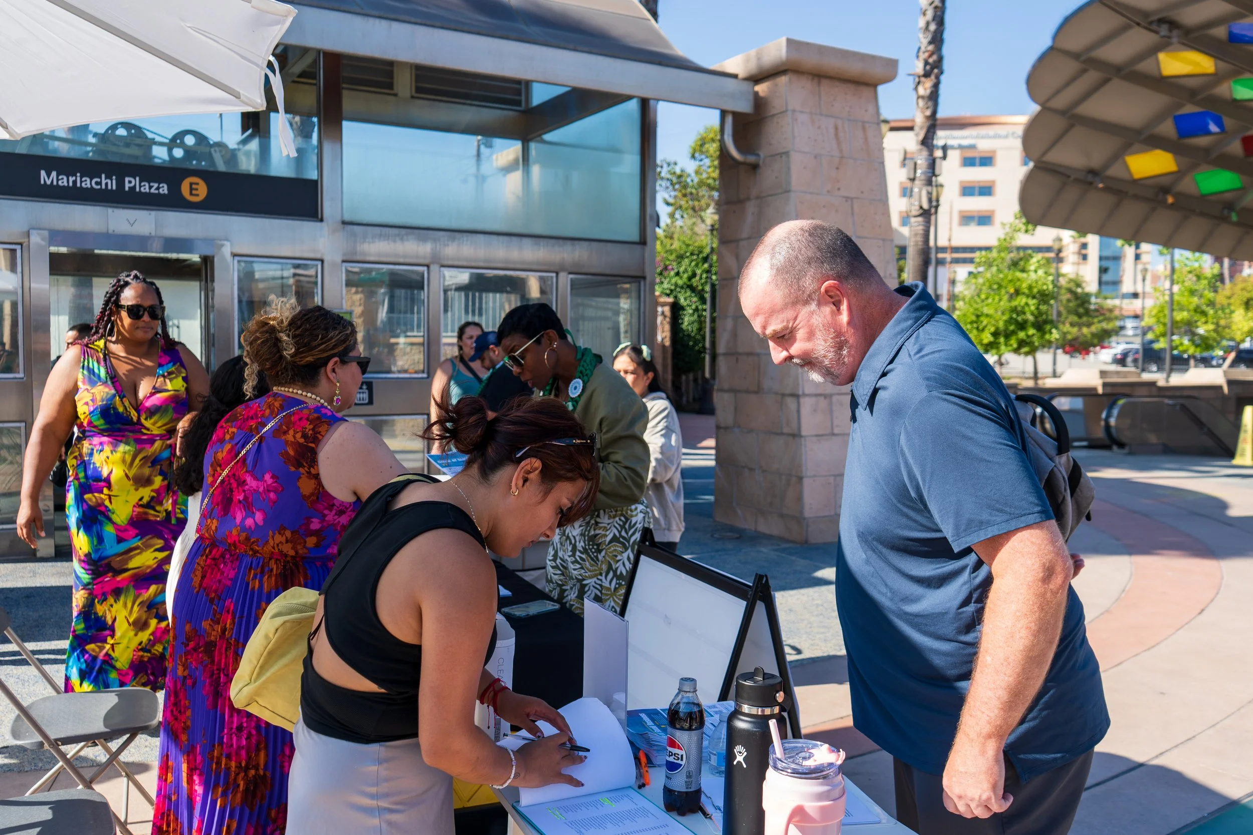 LEEAF EMI Graduation Sign Up in Mariachi Plaza