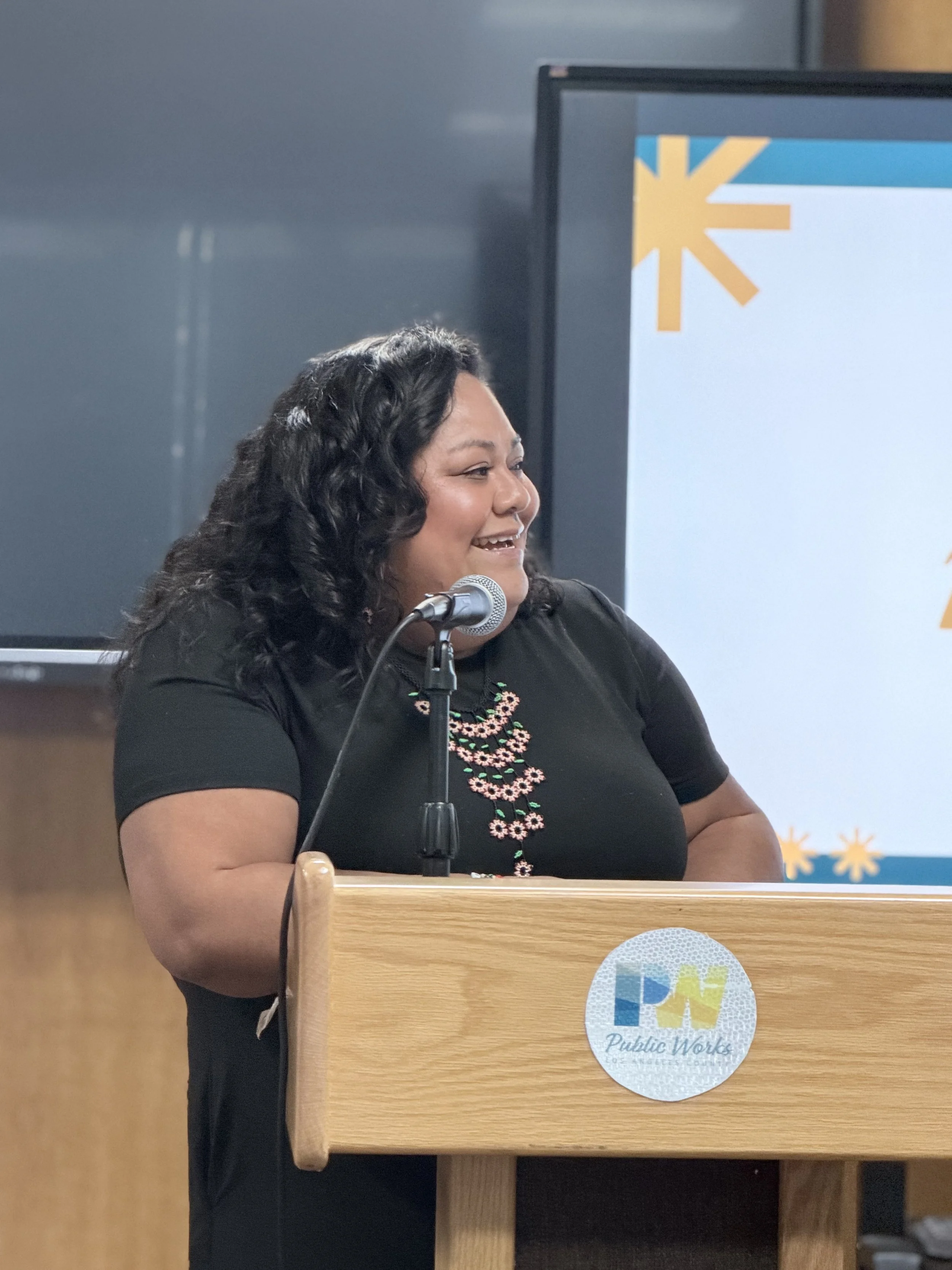 LEEAF Director Elianne speaking at an event