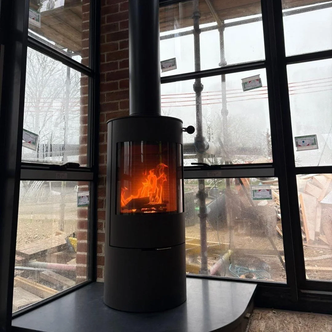 From traditional granite fireplaces, to modern glass extensions, we are yet to find a backdrop we don't like. 

These recent clients are building a gorgeous new living space for their home, and we were delighted to be involved, fitting the Rais Viva 