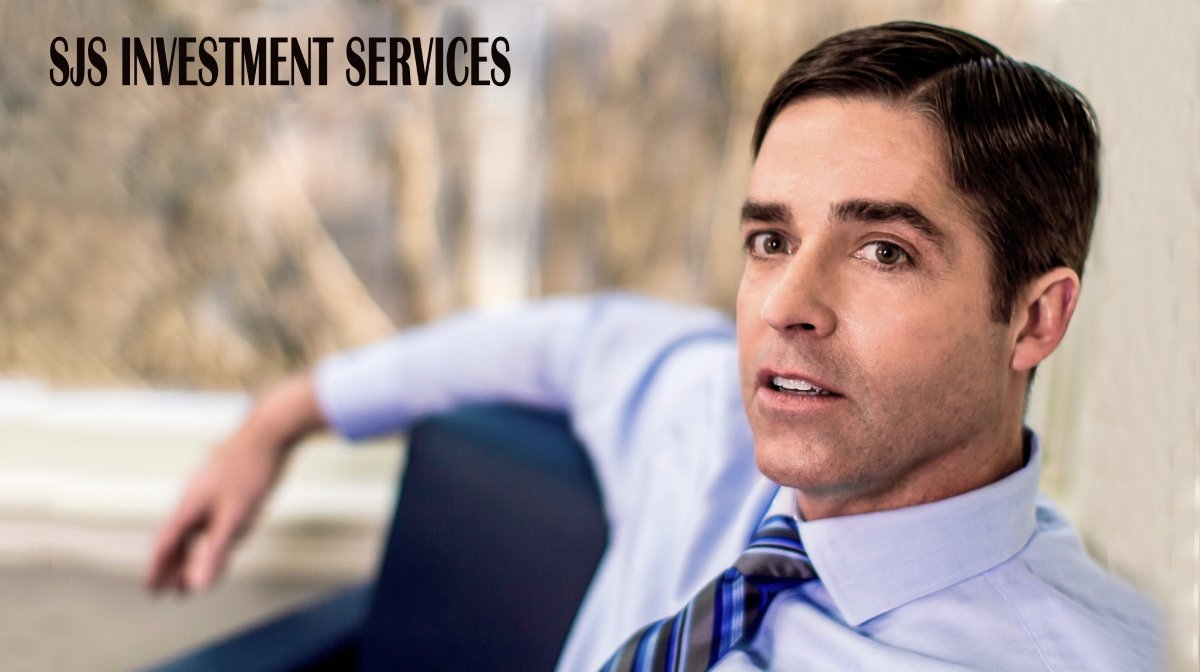 A man in a business shirt and tie sitting on a chair near a window, with the text 'SJS Investment Services' at the top.