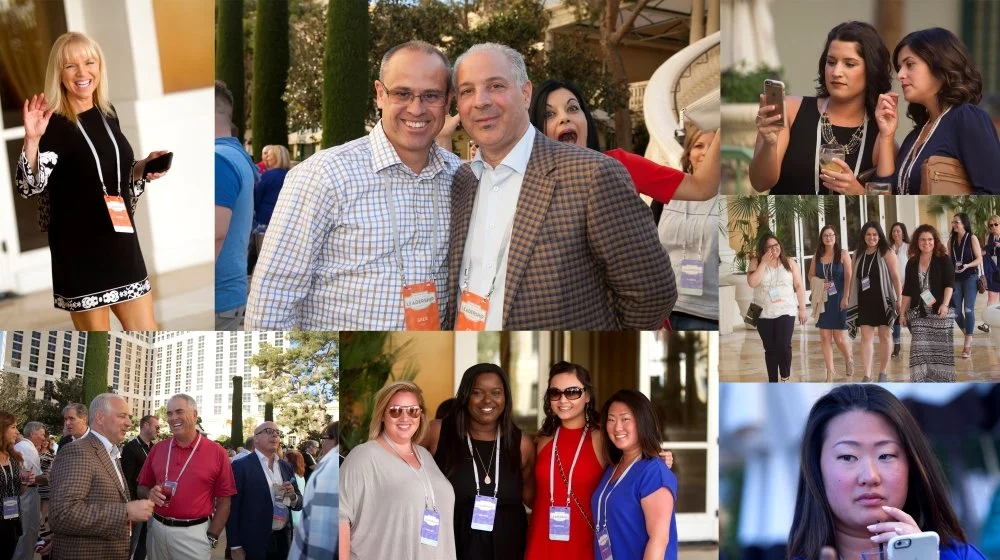 Group of diverse people at a professional outdoor event or conference, engaging in conversations and networking.